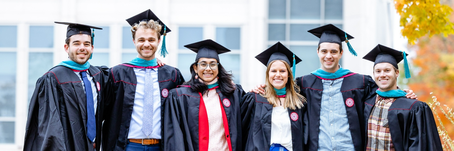 Smiling grad group 