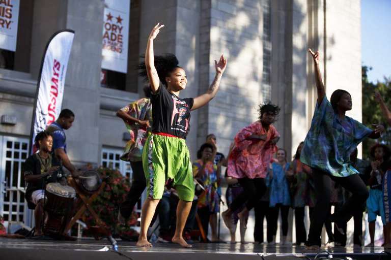 Dancers in front of the auditorium