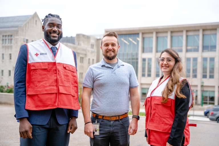 Red cross volunteers in front of the ONeill building